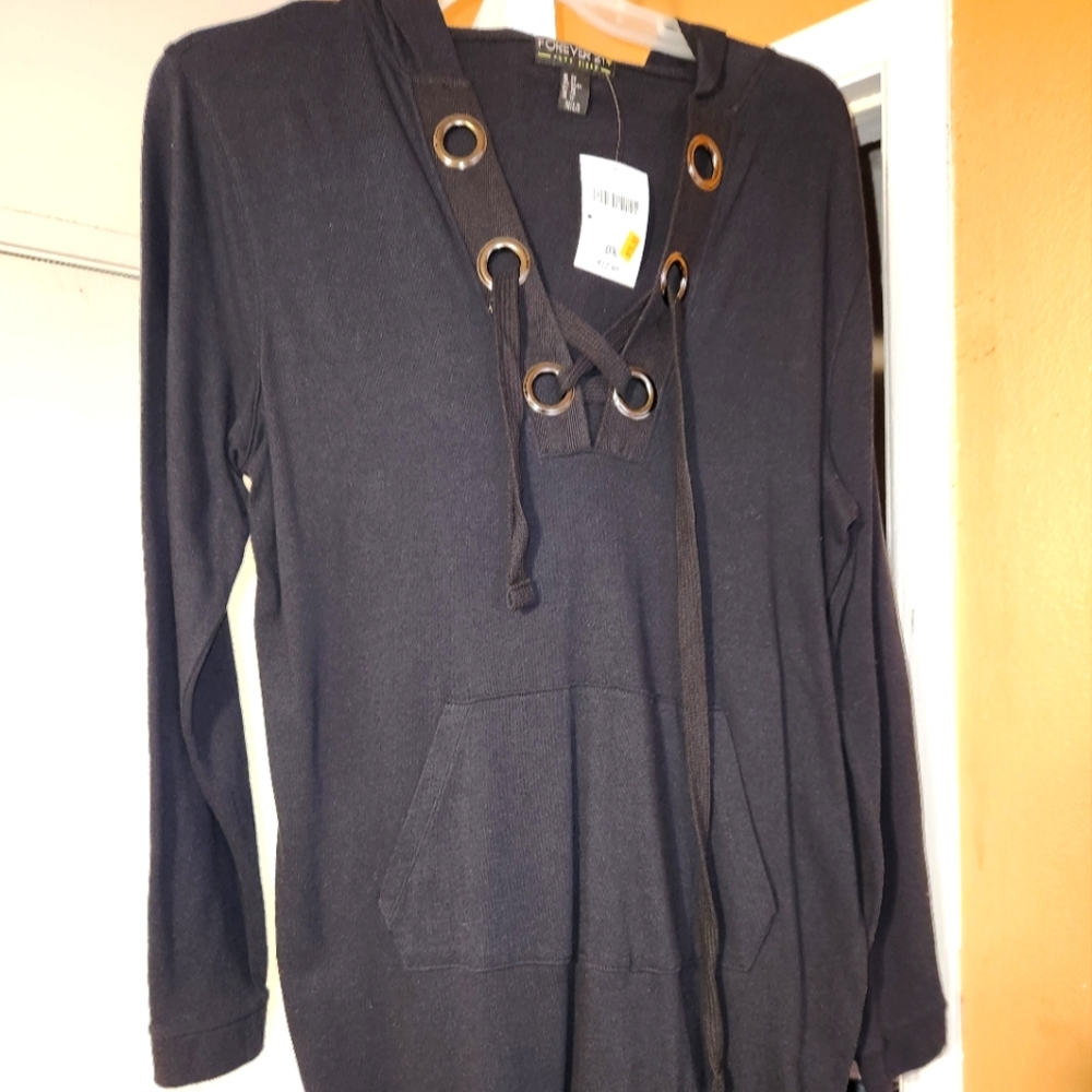 Cute black long sleeve sweater dress. Material isn't heavy either.